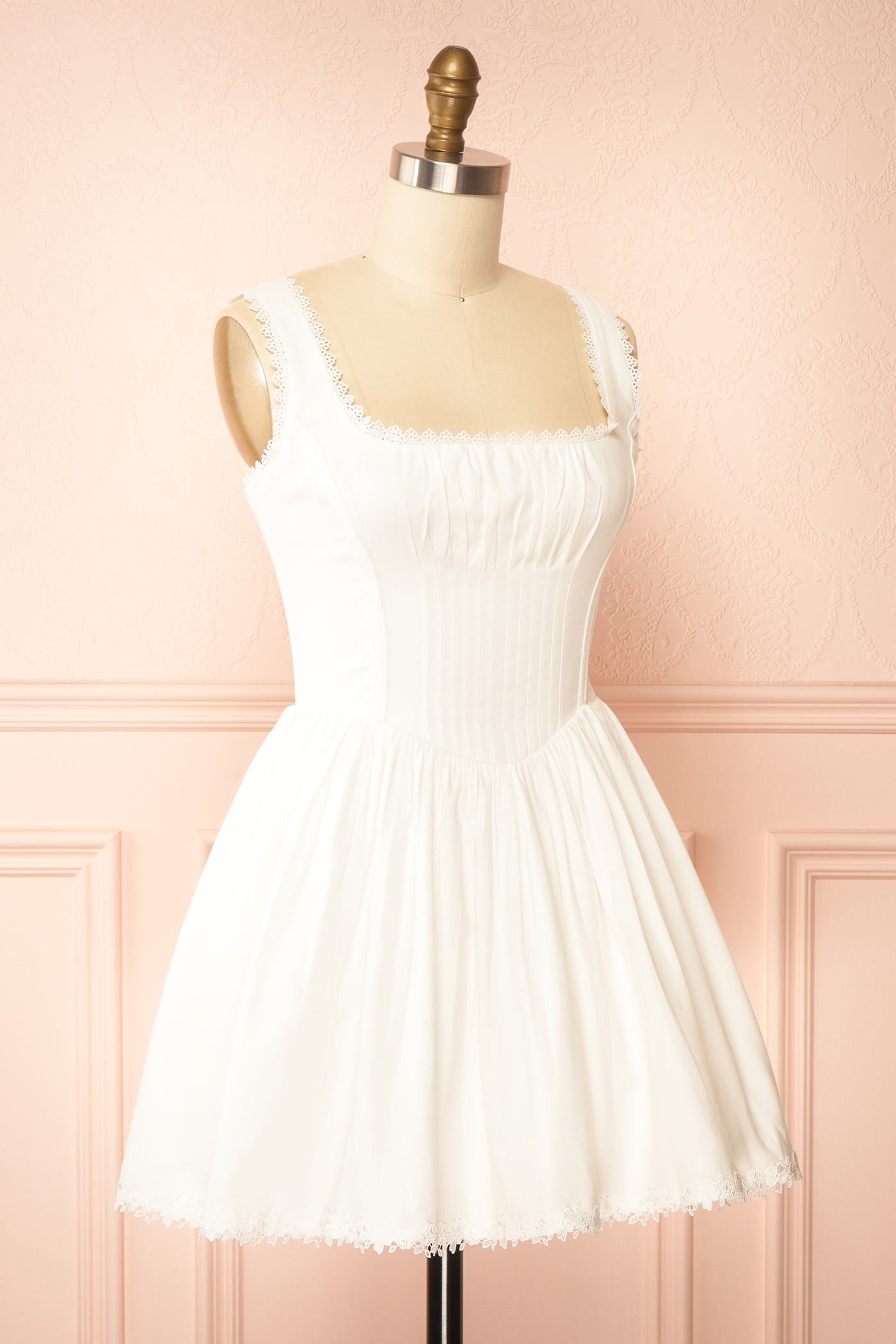 Sideview Sylvaine White Short Dress with Lace-Up Back and Pockets at la boutique 1861