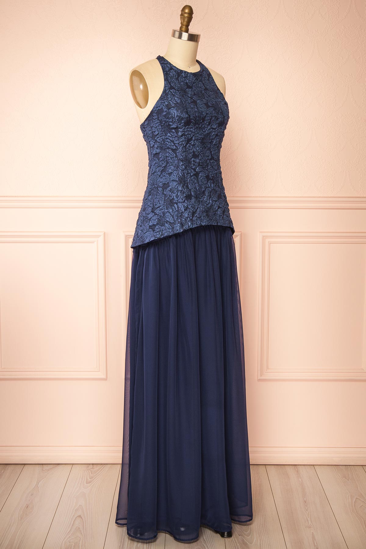 side view of Tantina Navy Jacquard Halterneck Maxi Dress at Boutique 1861