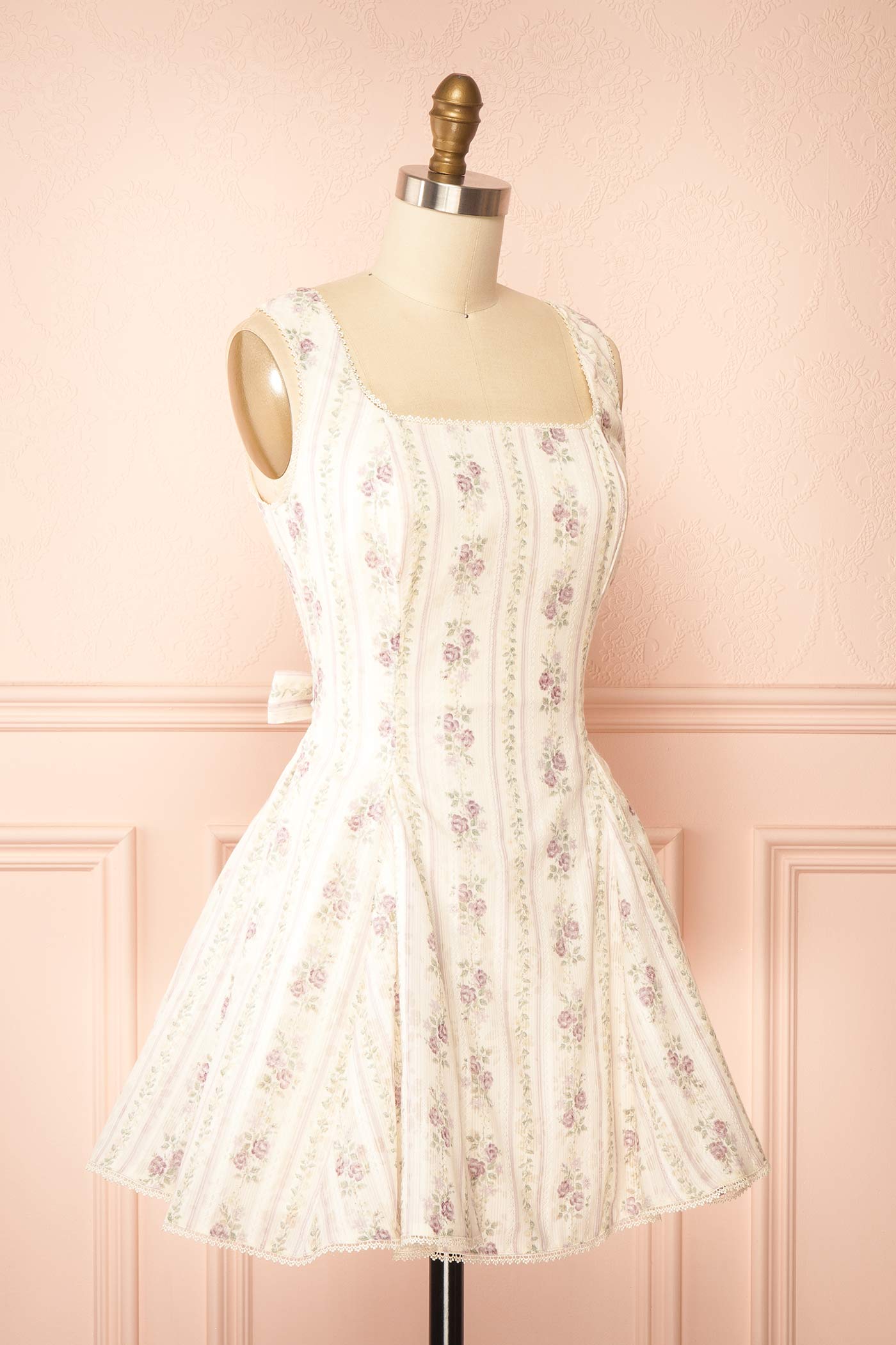 Sideview Theane Mauve Floral Short Dress with Back Bow at la boutique 1861
