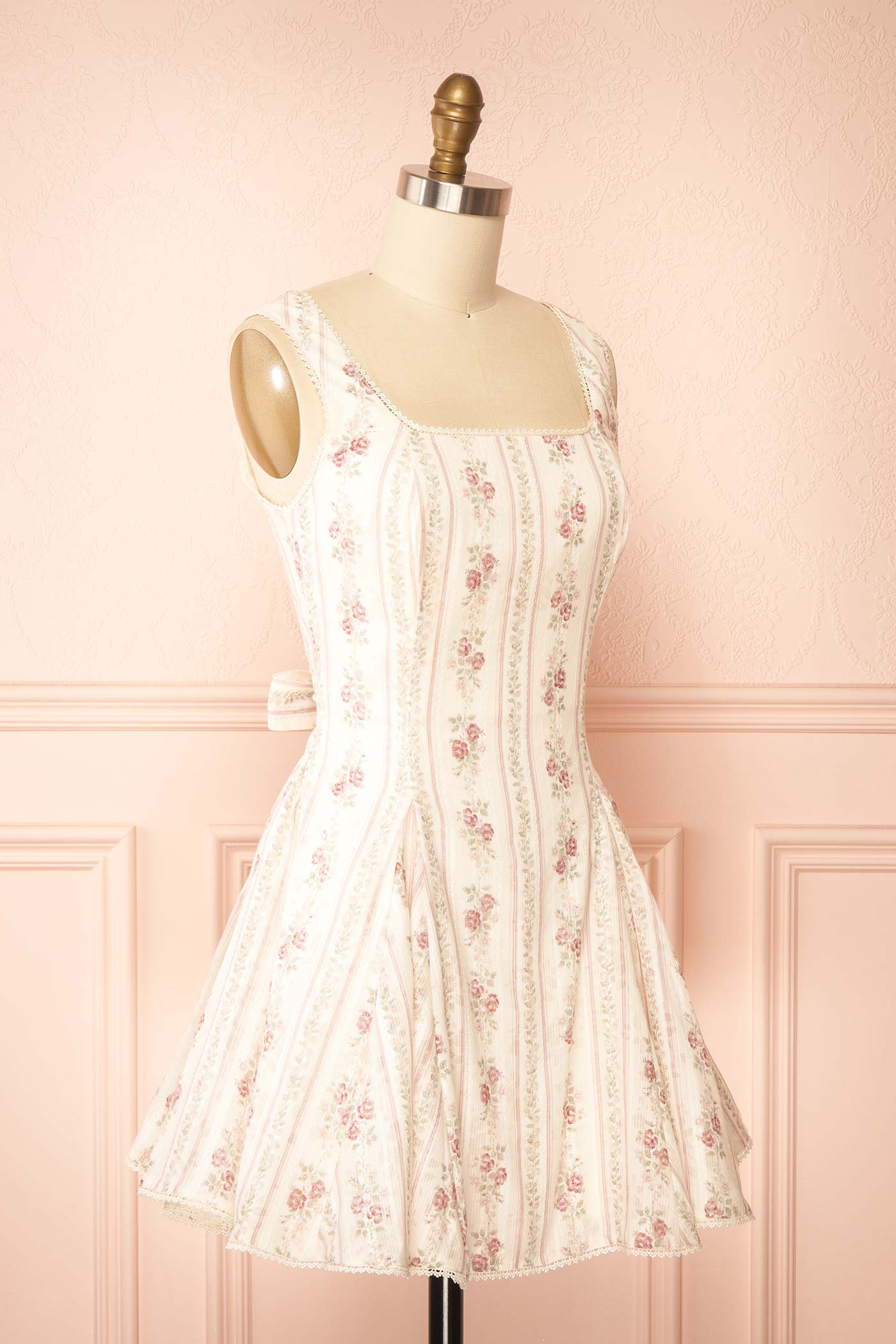 Sideview Theane Pink Floral Short Dress with Back Bow at la boutique 1861