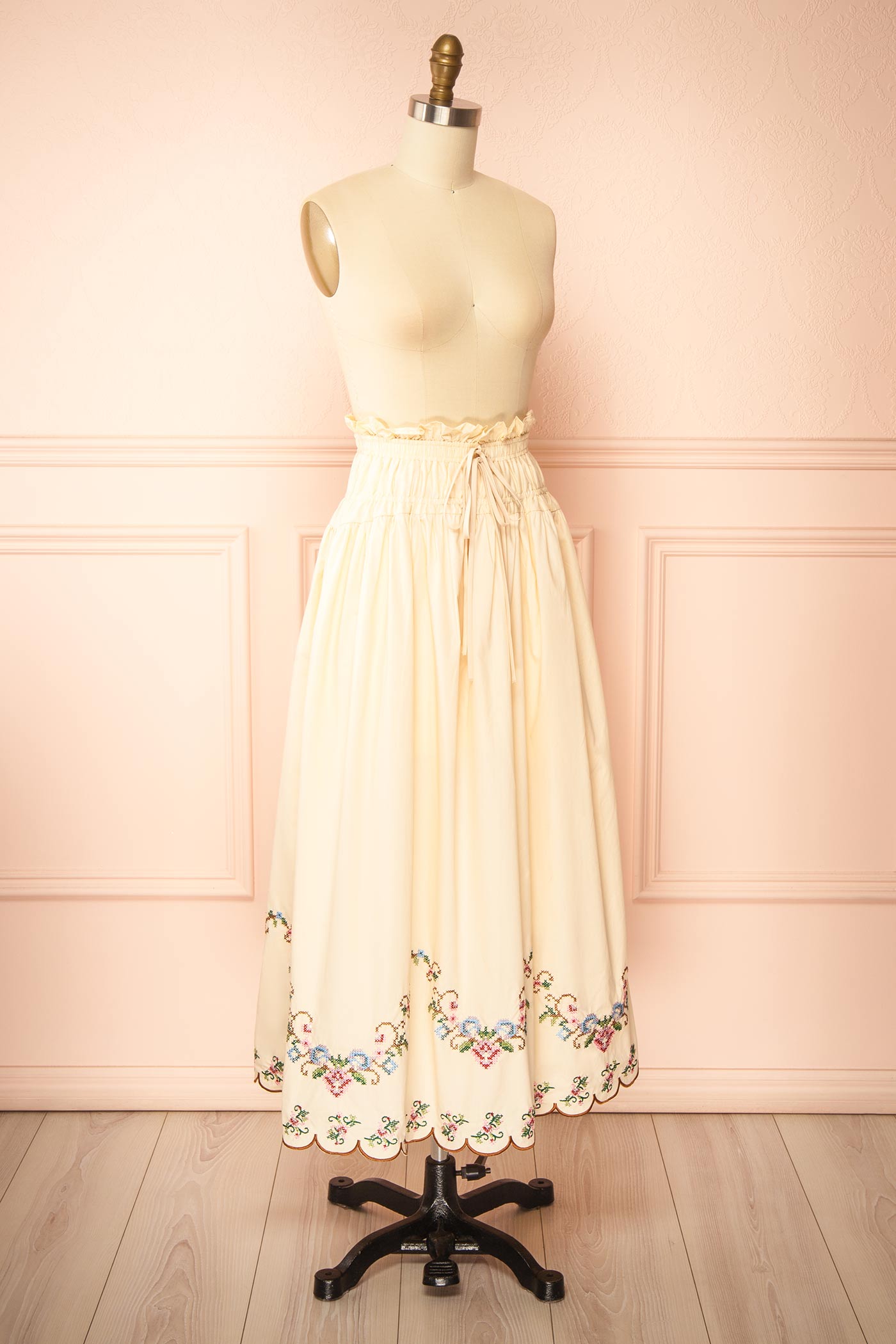 Sideview Thecle Beige Embroidered Midi Skirt at boutique 1861