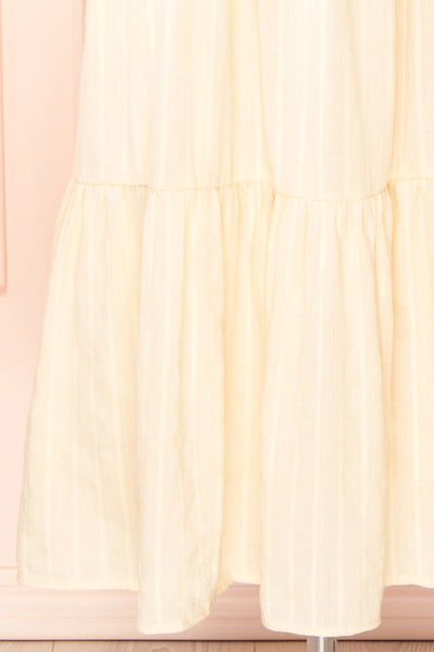 Thora Beige Midi Dress w/ Floral Embroidery | Boutique 1861 bottom close-up