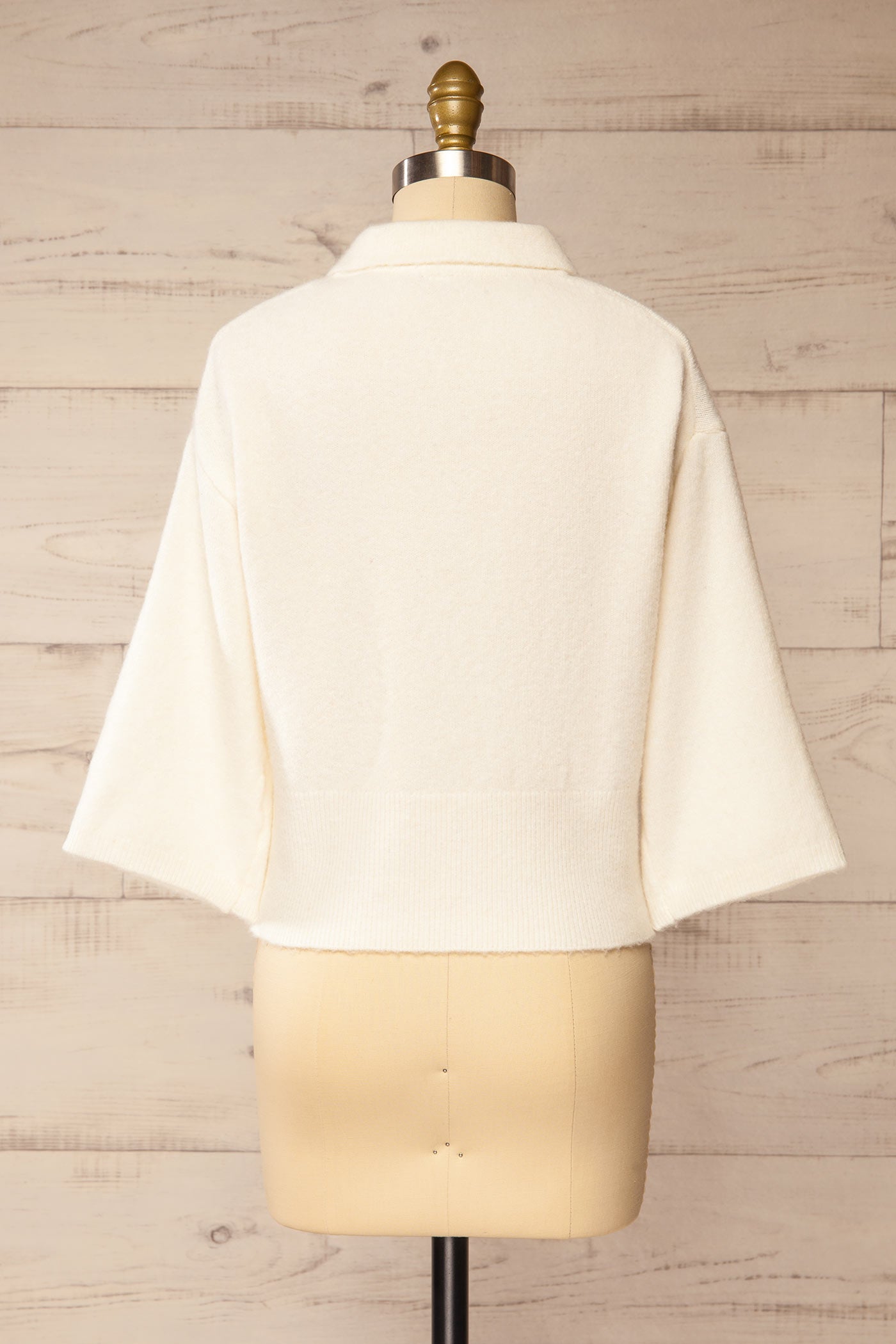back view of Tierbo Ivory Cardigan with 3/4 Sleeves at La petite garçonne