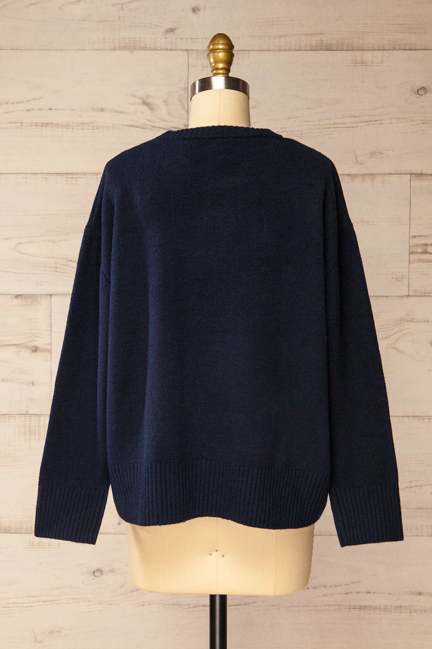 back view of Timboon Navy High-Low Knit Sweater at La petite garçonne
