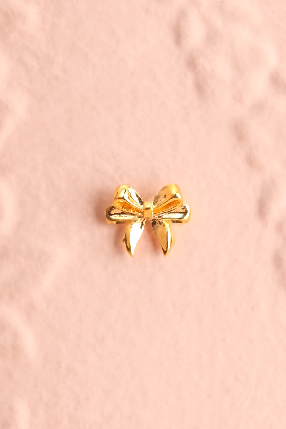 Tiresia Gold Bow Stud Earrings | Boutique 1861 close-up