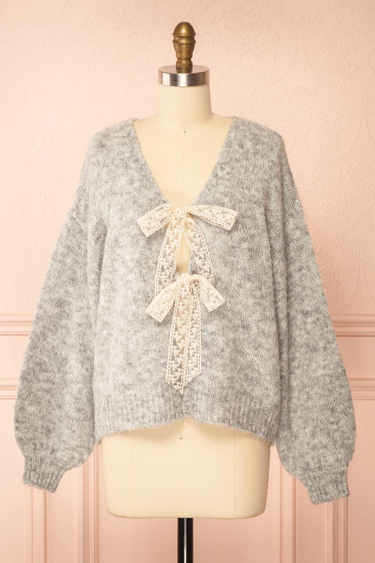 front view of Tsubaki Grey Knit V-Neck Cardigan Sweater with Lace Bows at Boutique 1861