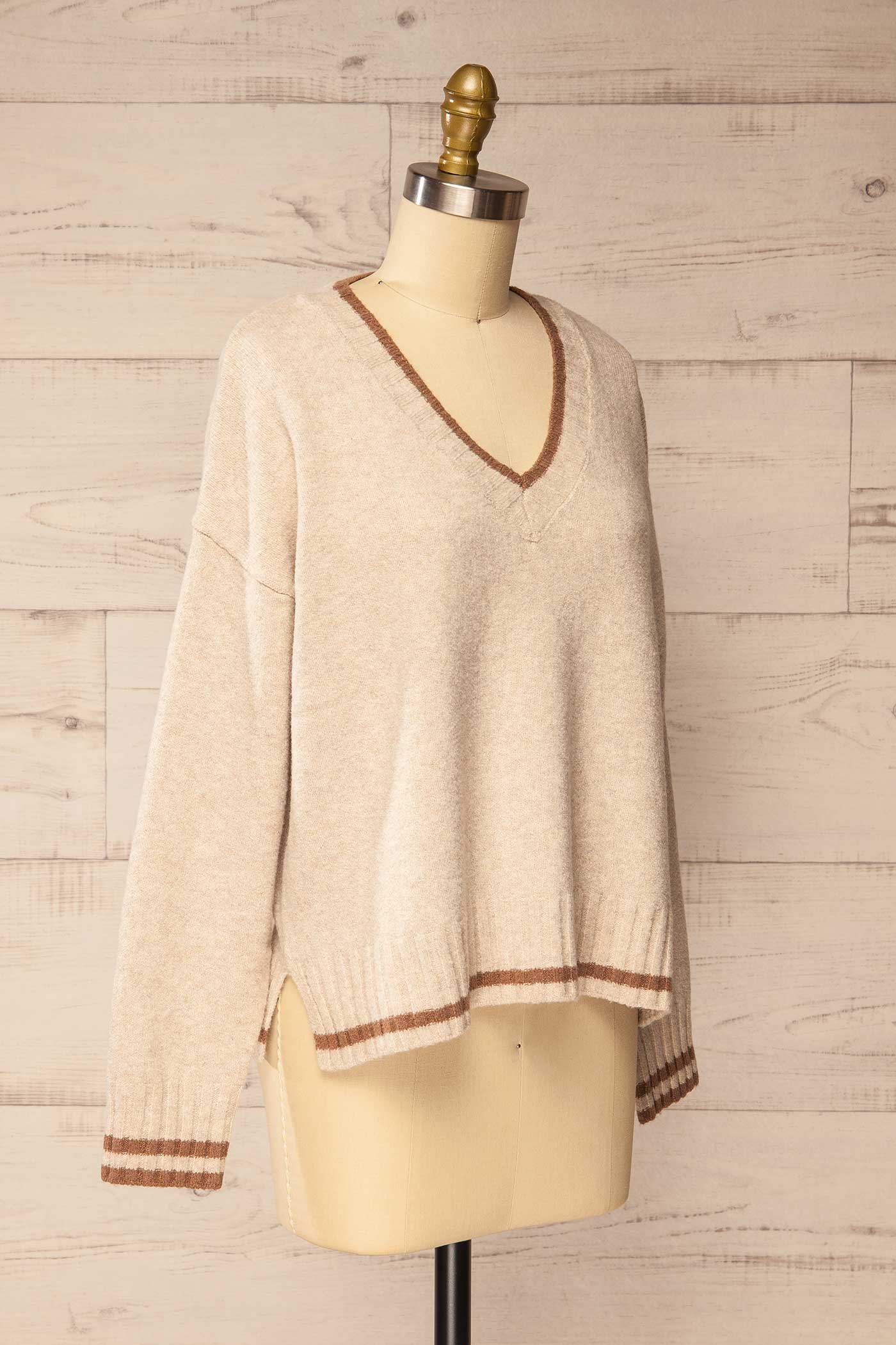 side view of Ulladulla Beige V-Neck Knit Sweater at La petite garçonne