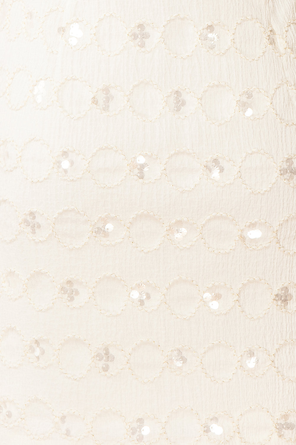 Vaniska Short Sparkling Ivory Dress | Boutique 1861 texture