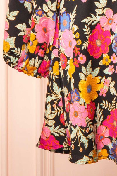 Veradis Black Short Dress w/ Colorful Floral Pattern | Boutique 1861 bottom