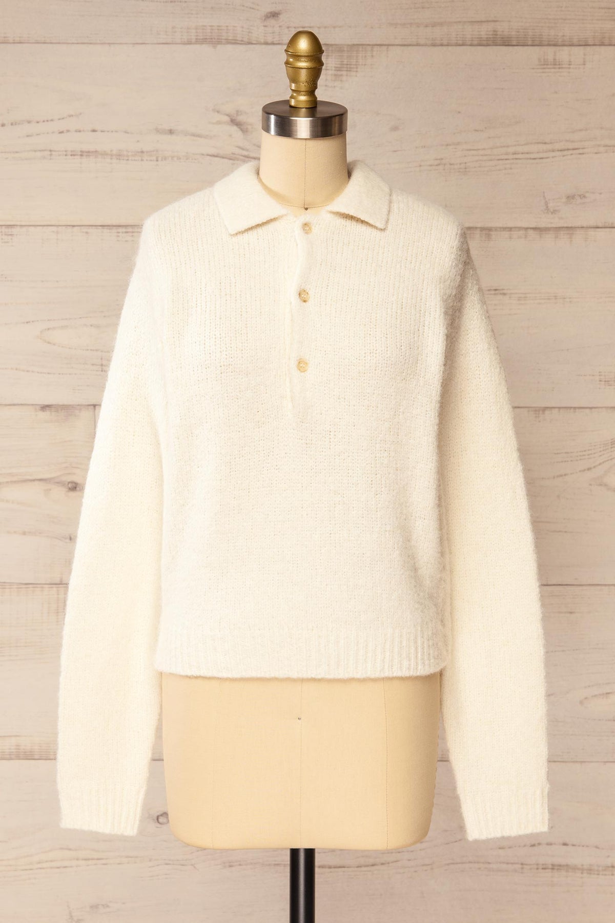 front view of Voront Ivory Knit Sweater with Polo Neck at La petite garçonne