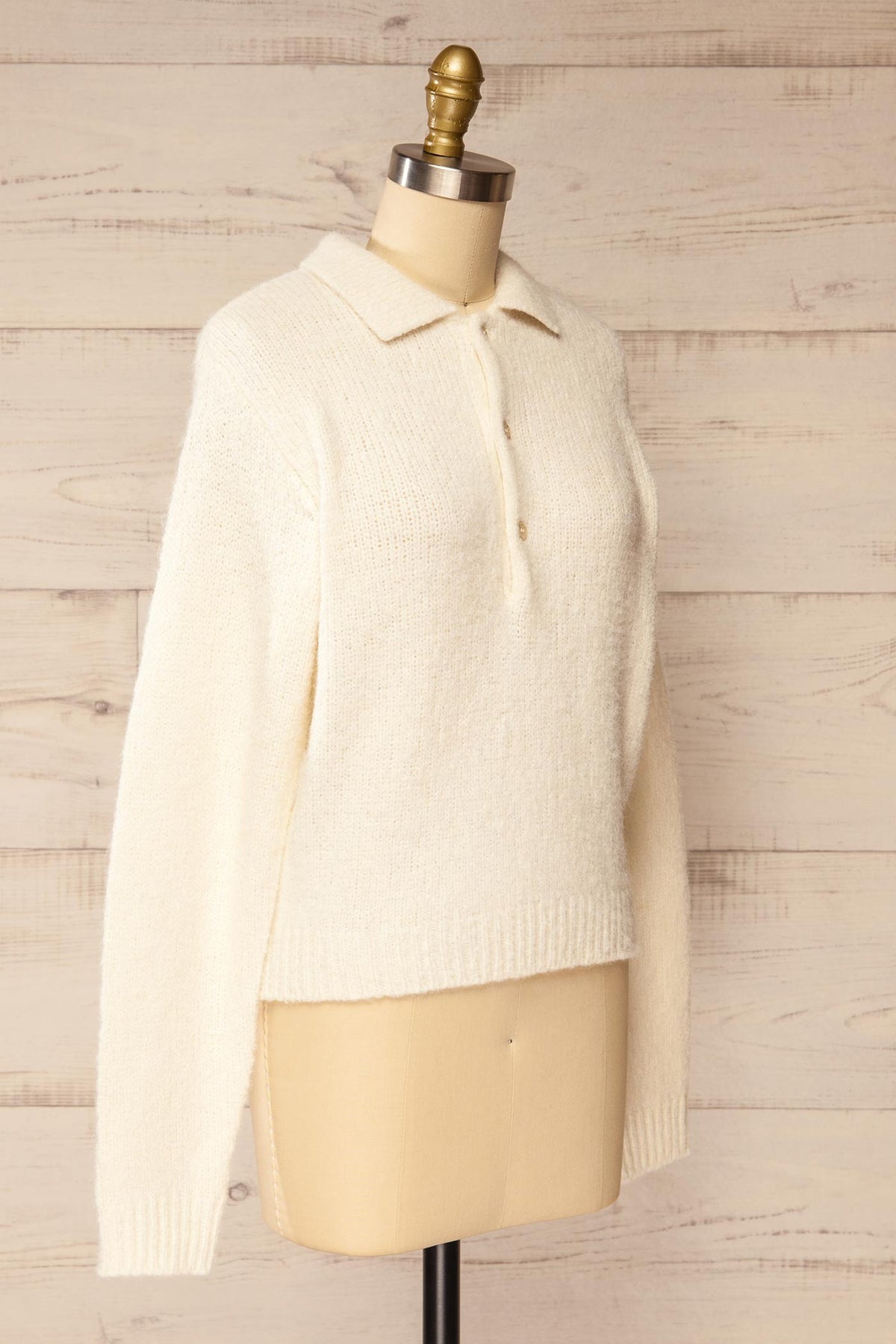 side view of Voront Ivory Knit Sweater with Polo Neck at La petite garçonne