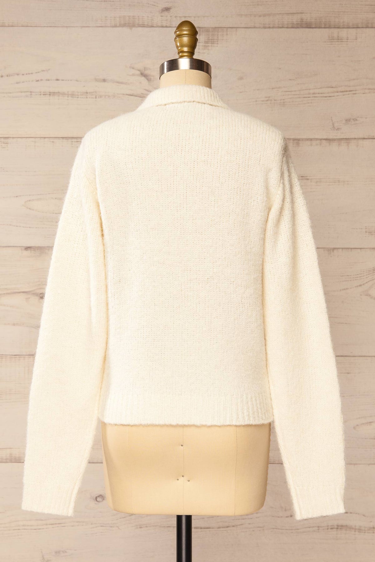 back view of Voront Ivory Knit Sweater with Polo Neck at La petite garçonne