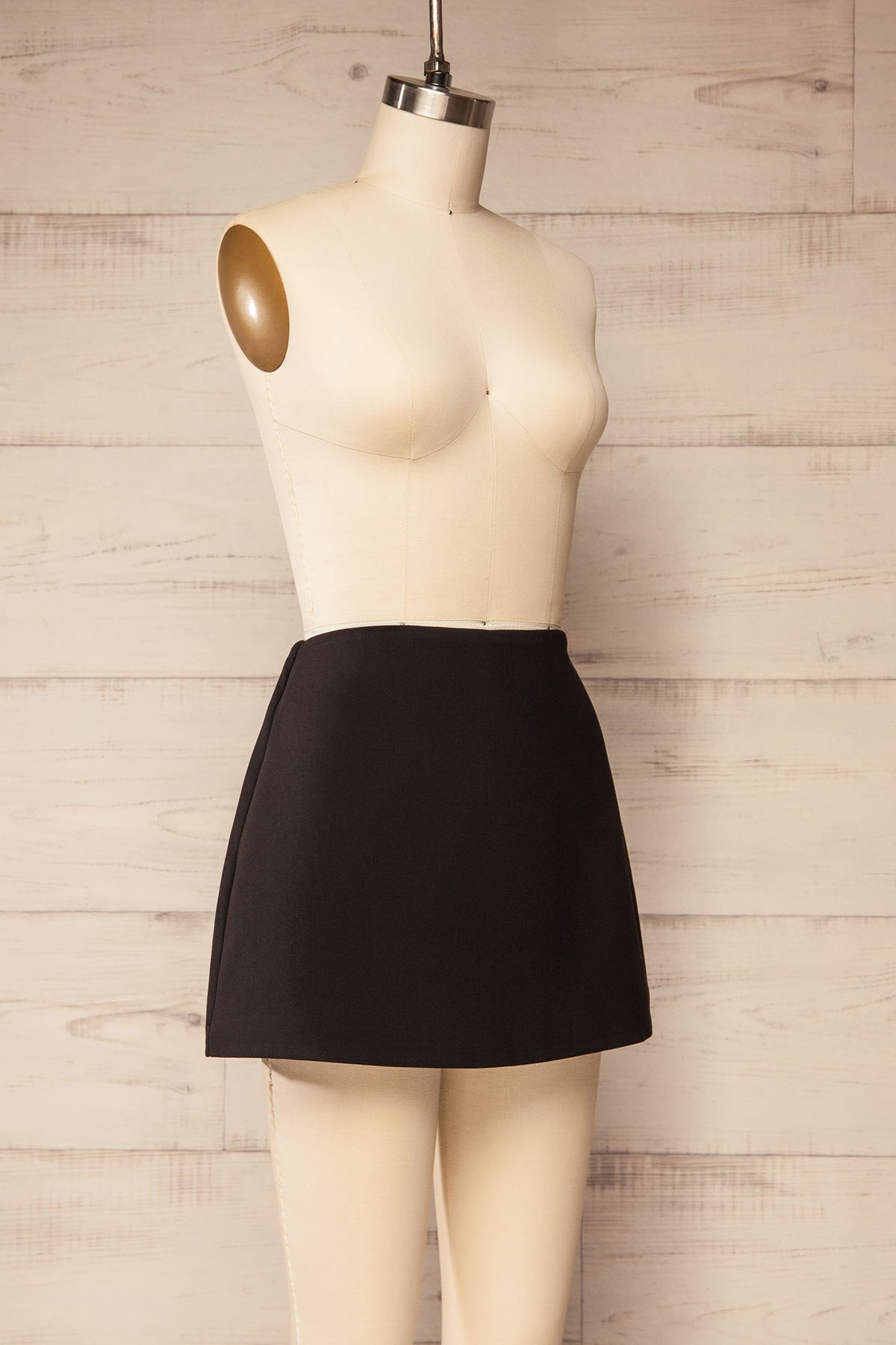 side view of Woburn Black High-Waisted Tailored Skort at La petite garçonne