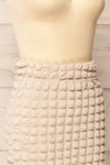 Wyrley Beige Popcorn Textured Midi Skirt | La petite garçonne side