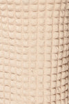 Wyrley Beige Popcorn Textured Midi Skirt | La petite garçonne fabric
