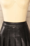 Xichang Black Faux Leather Short Pleated Skirt | La petite garçonne  front close-up