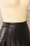 Xichang Black Faux Leather Short Pleated Skirt | La petite garçonne  side close-up