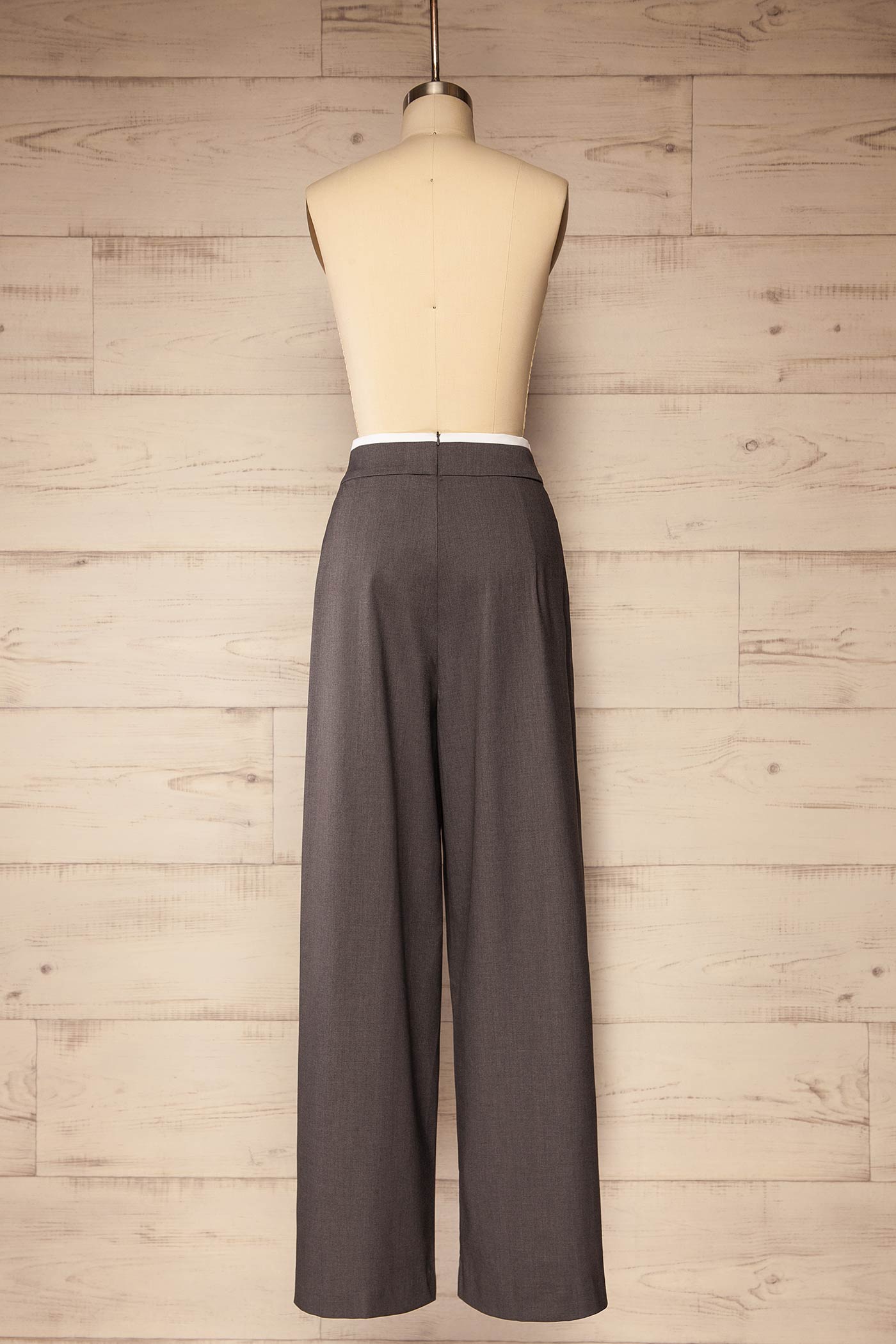 back view of Yakutsk Grey Overlap Wide-Leg Pleated Pants at La petite garçonne