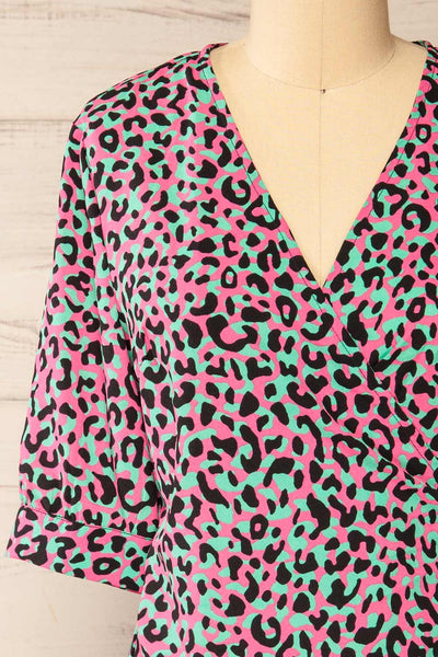 Zekia Pink Leopard Print Short Sleeve Wrap Dress | La petite garçonne front close-up