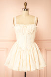 front view of Zolda Ivory Short Jacquard Corset Dress with Back Bow at Boutique 1861