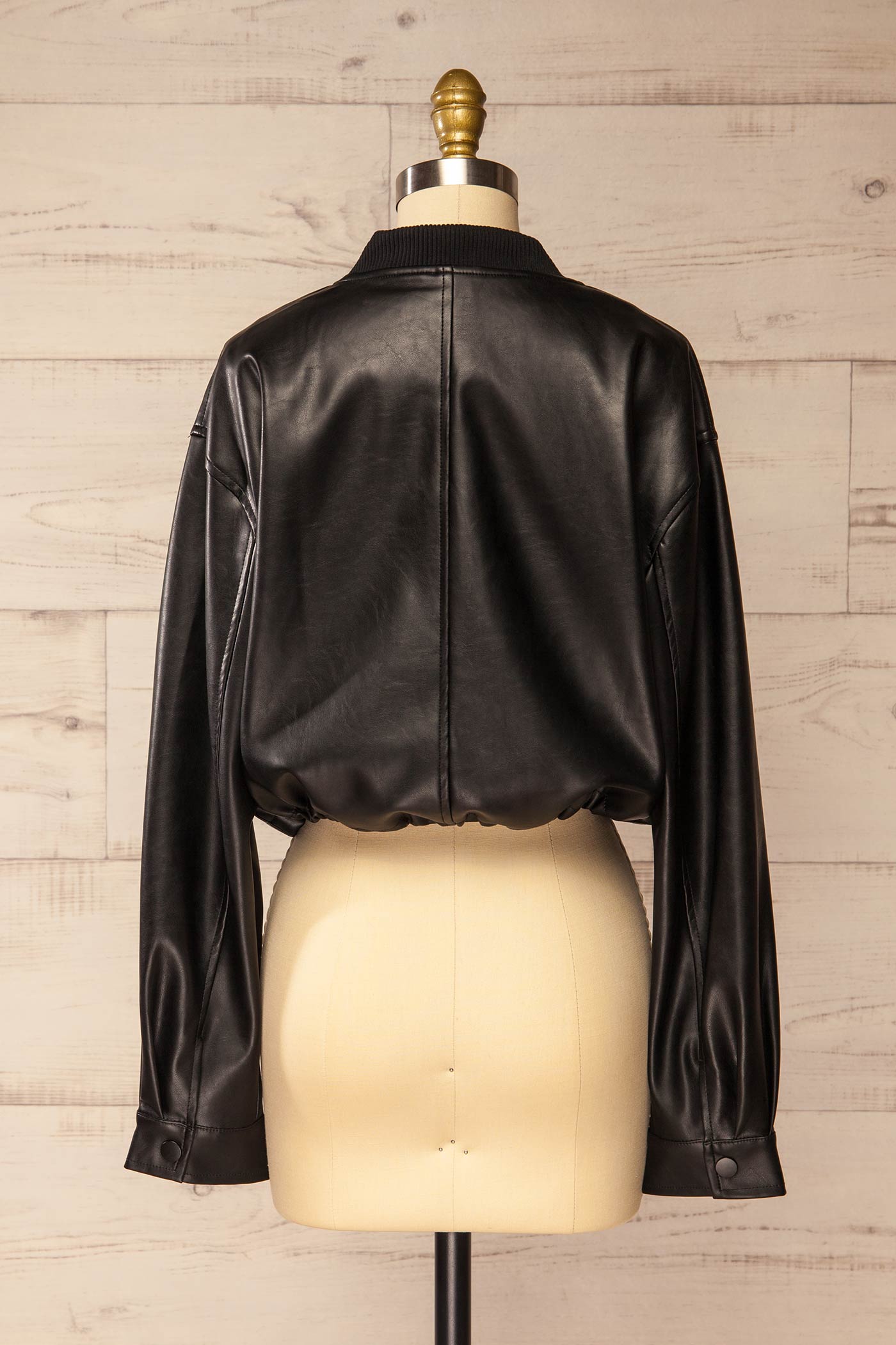 back view of Zottegem Black Faux-Leather Cropped Jacket at La petite garçonne