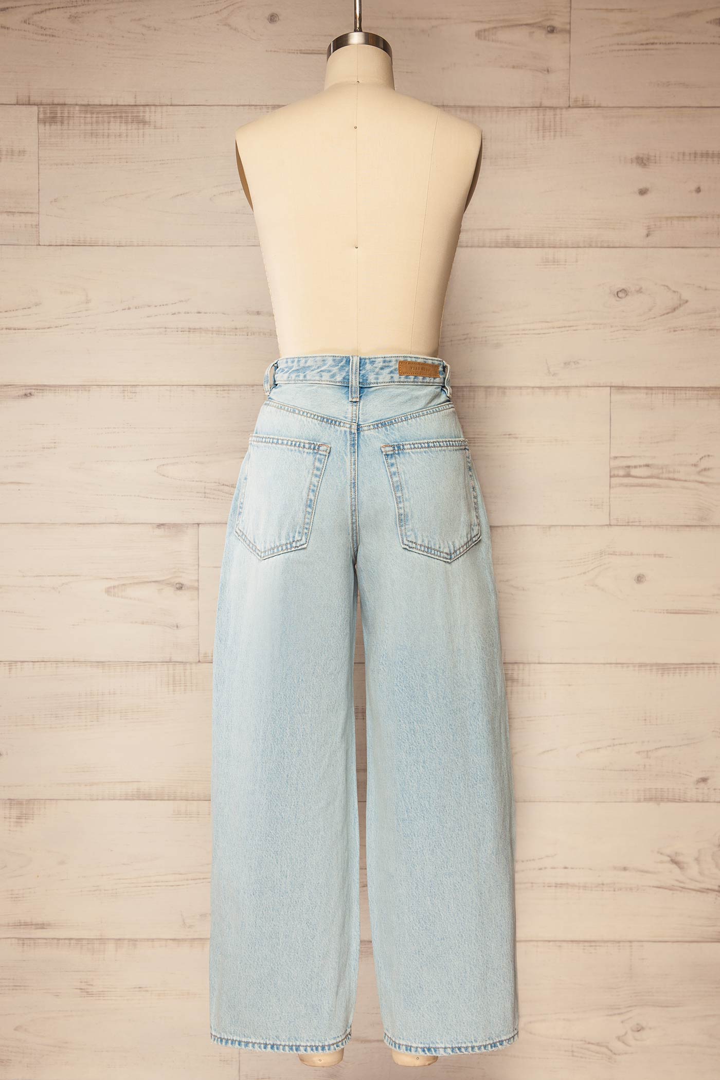 back view of Zurique Blue High-Waisted Seam-Detail Barrel-Leg Jeans at La petite garçonne