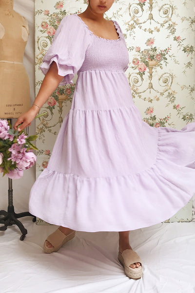 Abra Lavender Tiered Midi Dress w/ Puffy Sleeves | Boutique 1861 model twirl