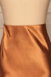 Alia Bronze Midi Satin Skirt | Jupe back close up | La Petite Garçonne