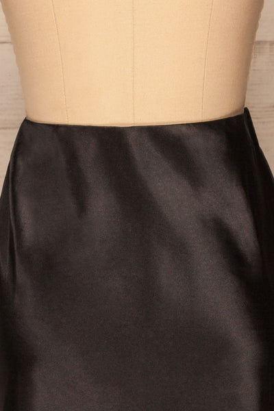 Alia Noir Black Midi Satin Skirt | Jupe back close up | La Petite Garçonne