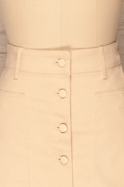 Alijo Beige Button-Up Mini Skirt with Pockets | La Petite Garçonne front close-up