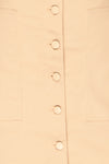 Alijo Beige Button-Up Mini Skirt with Pockets | La Petite Garçonne fabric detail