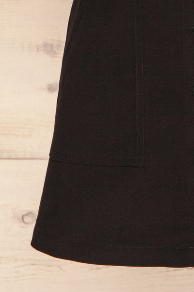 Alijo Black Button-Up Mini Skirt with Pockets | La Petite Garçonne bottom close-up