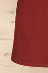 Alijo Burgundy Button-Up Mini Skirt with Pockets | La Petite Garçonne bottom close-up
