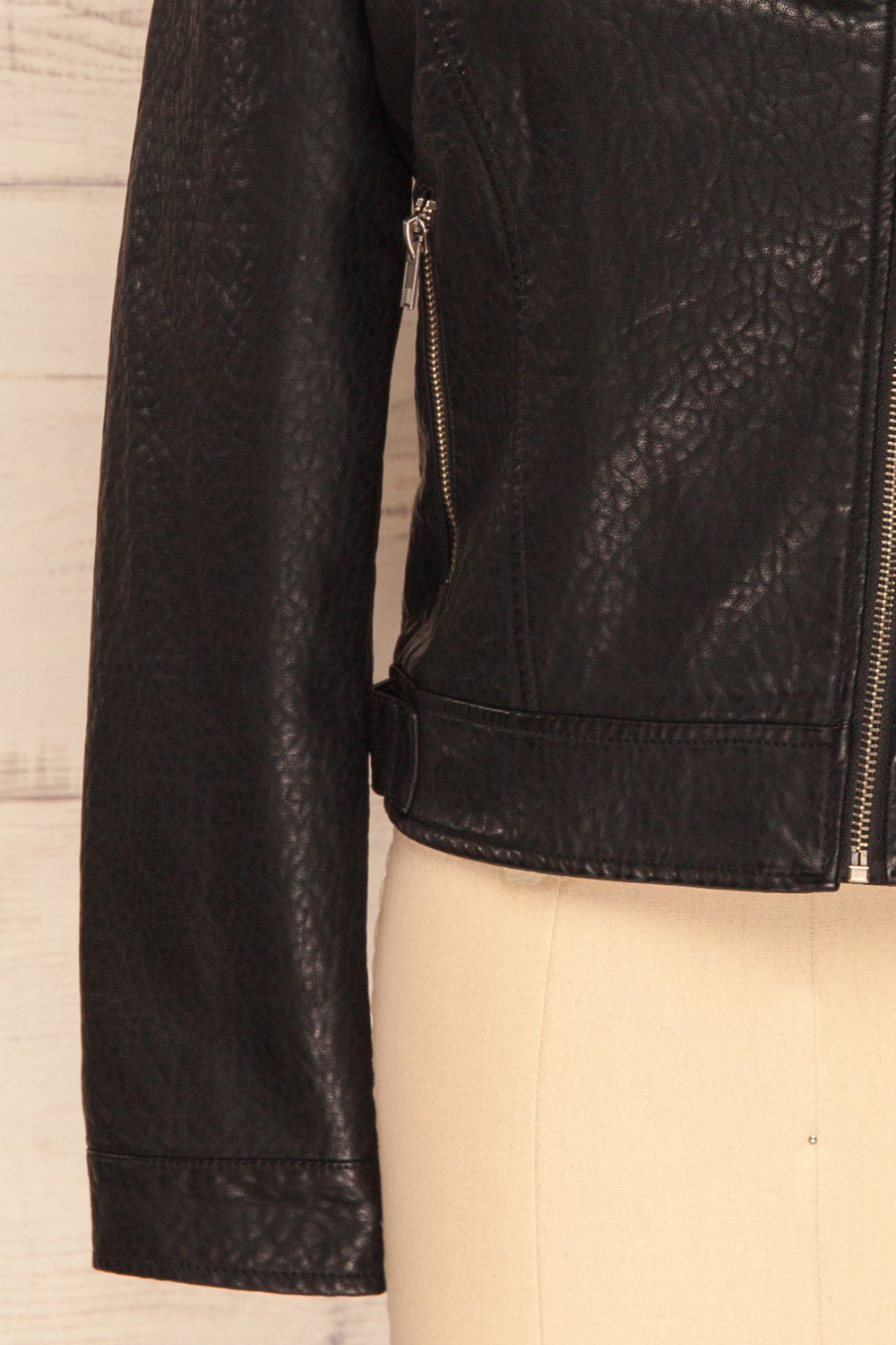 Almada Black Faux Leather Motorcycle Jacket | SLEEVE CLOSE UP | La Petite Garçonne