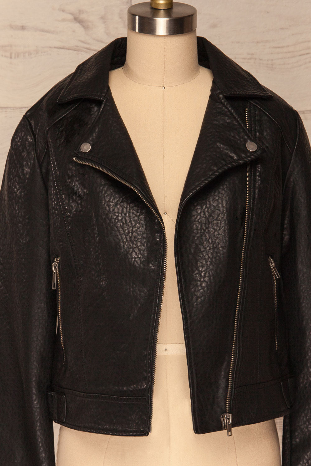 Almada Black Faux Leather Motorcycle Jacket | FRONT CLOSE UP ZIPPER OPEN | La Petite Garçonne