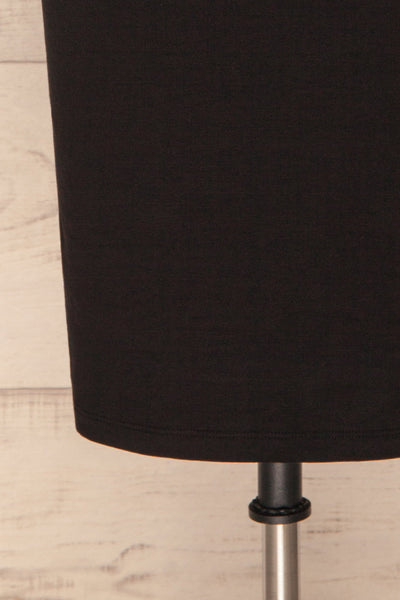 Alsdorf Poivre Black Long Sleeved Fitted Dress | La Petite Garçonne bottom close-up