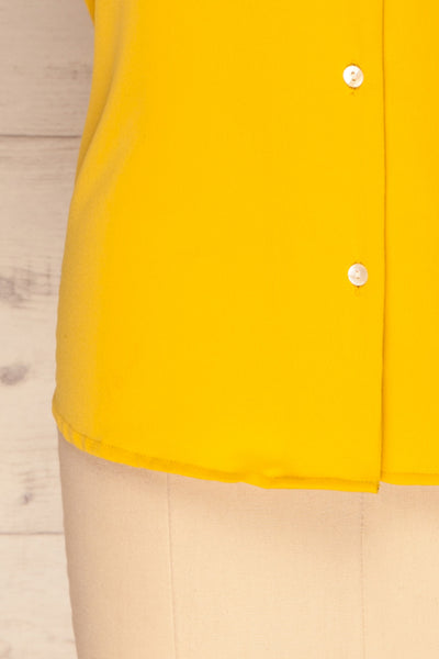 Andria Field Yellow Short Sleeved Blouse | La Petite Garçonne bottom close-up