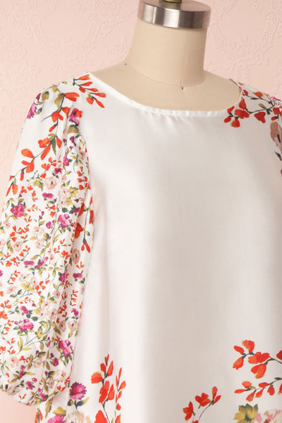 Angelica White Floral Puffy Sleeve Dress | Boutique 1861 side close up