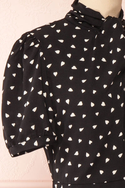 Arlette Black Patterned Short Sleeve Dress | Boutique 1861 side close-up
