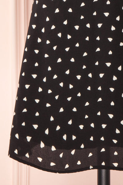 Arlette Black Patterned Short Sleeve Dress | Boutique 1861 bottom