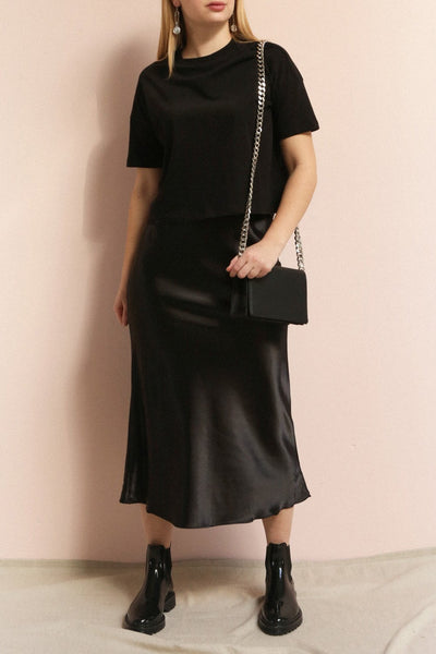 Alia Noir Black Midi Satin Skirt | La Petite Garçonne on model
