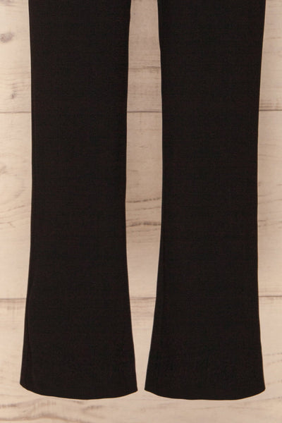 Balsillar Black Sleeveless Scalloped Jumpsuit | La Petite Garçonne bottom close up