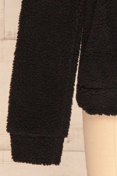 Banff Black & White Wooly Fleece Sweater | La Petite Garçonne bottom close-up