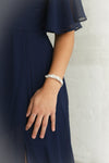 Baucis Argent Crystal Studded Silver Bangle Bracelet | Boutique 1861 on model