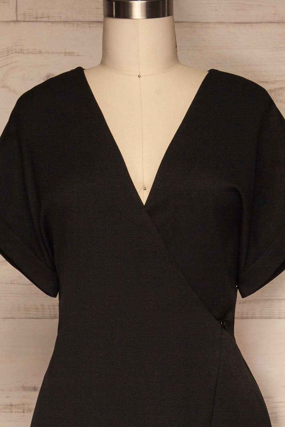 Brescia Black Short Sleeve Wrap Romper front close up | La petite garçonne