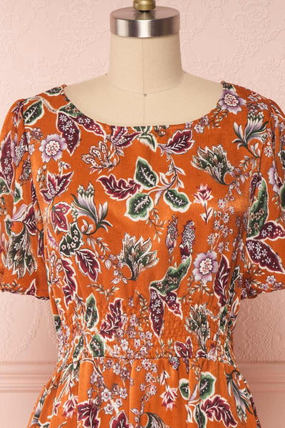Cahan Cinnamon Orange Floral Silky Midi Dress face close up | Boutique 1861