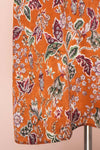Cahan Cinnamon Orange Floral Silky Midi Dress skirt close up | Boutique 1861