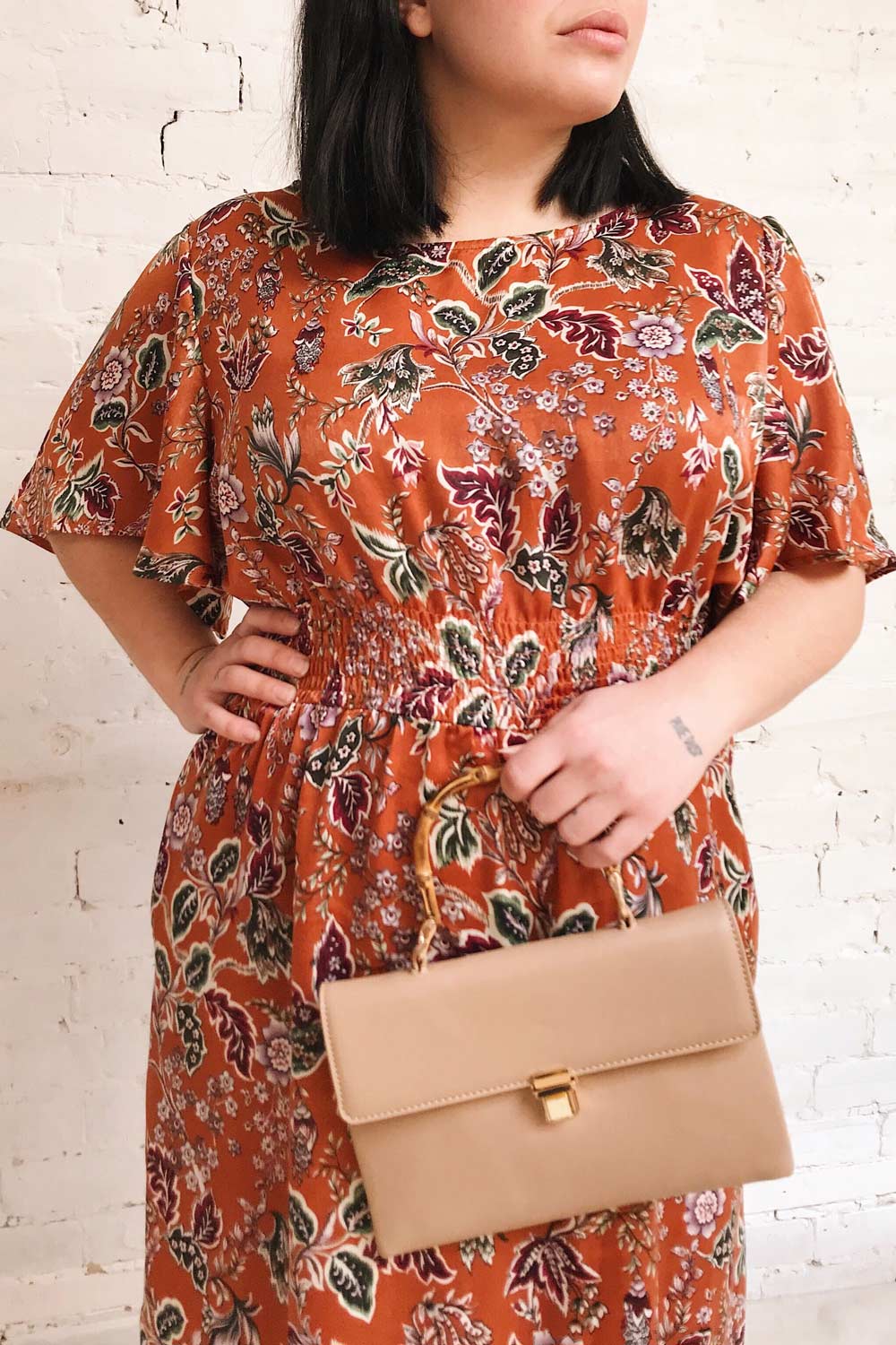 Cahan Cinnamon Orange Floral Midi Dress | Boutique 1861 on model