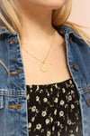 Capricorne Doré Gold Pendant Necklace | La Petite Garçonne on model