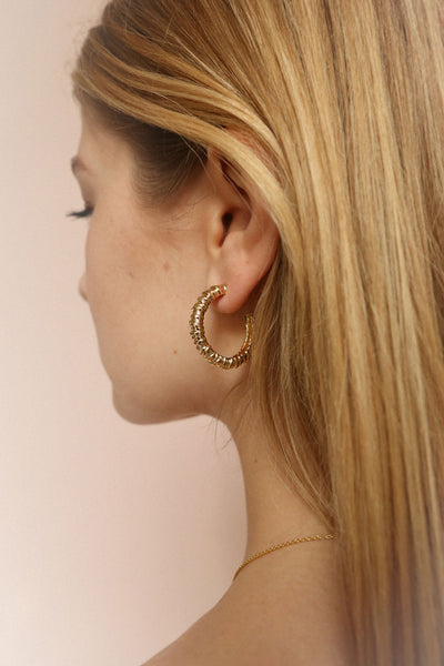 Caraquez Golden Hoop Earrings | La petite garçonne on model